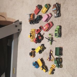 Assortment of used construction, industrial and miscellaneous toy vehicles